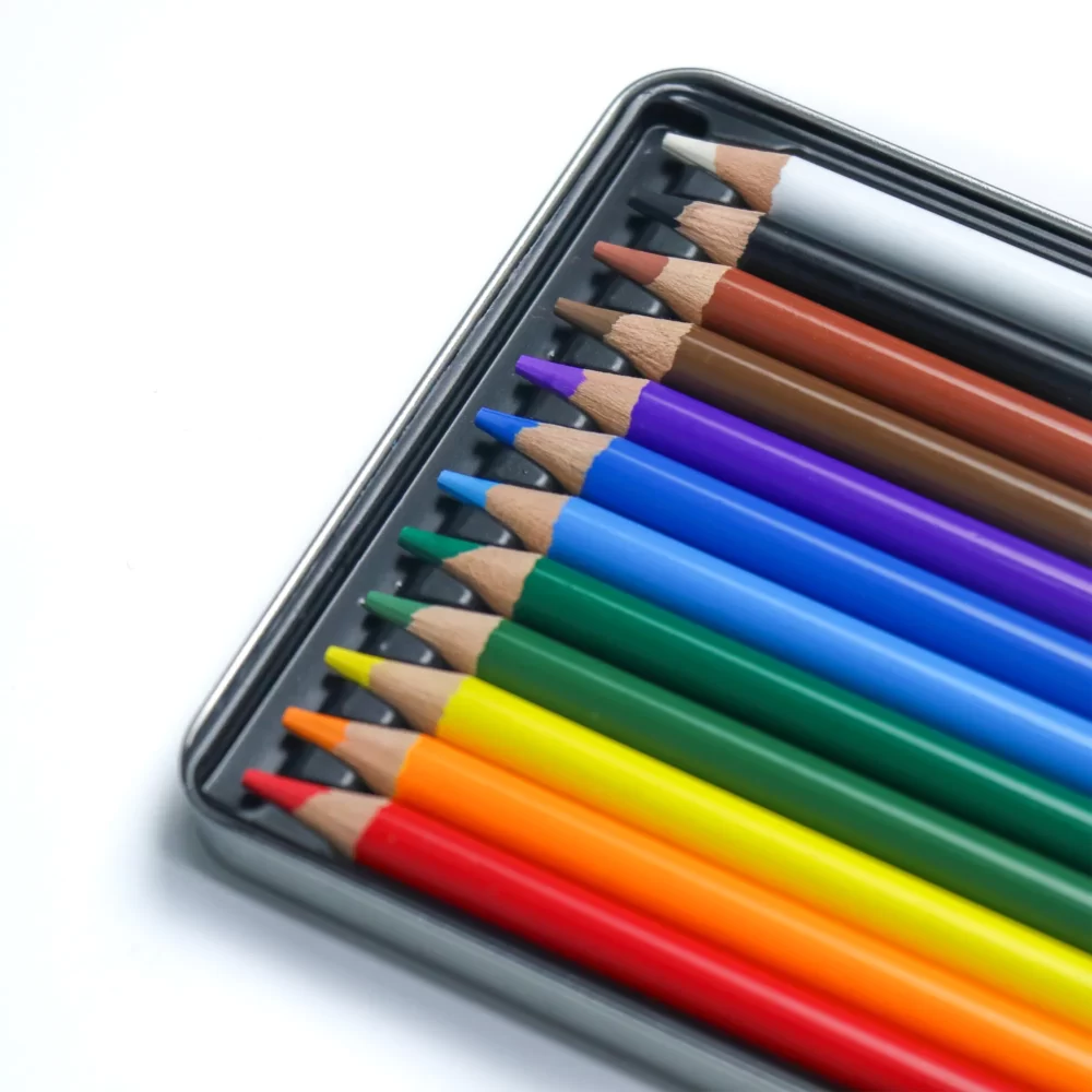 Colored pencils in iron boxes